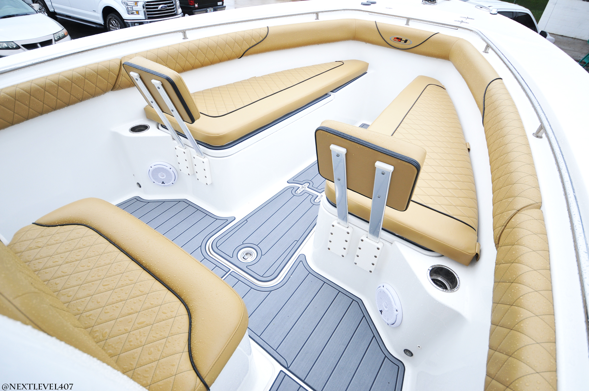 https://floridamarinecustoms.com/wp-content/uploads/2020/11/Next-Level-Custom-Boat-Floor-SeaDek-and-Seats-Upholstery-LG.jpg