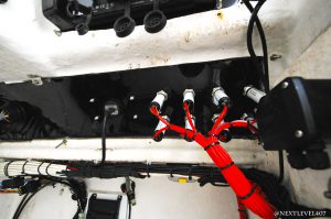 Yellow-Boat-Acrylic-Dash-On-Continental-Trailer-Close-Up-Red-Undercarriage-Wire-Management