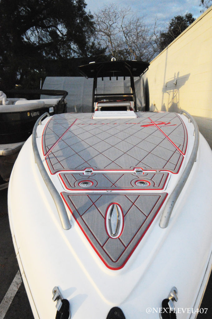Red-Renegade-Boat-2-Sea-Dek-Marine-Flooring-Pad-Customized-Red-With-Logo-Head-On-Front-Half