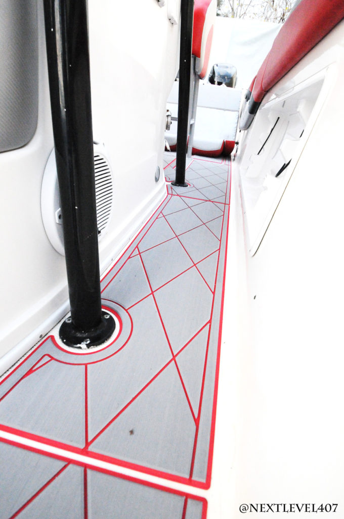 Red-Renegade-Boat-2-Sea-Dek-Marine-Flooring-Pad-Customized-Red-With-Logo-Sea-Dek-Walk-Path-Flooring-Trim