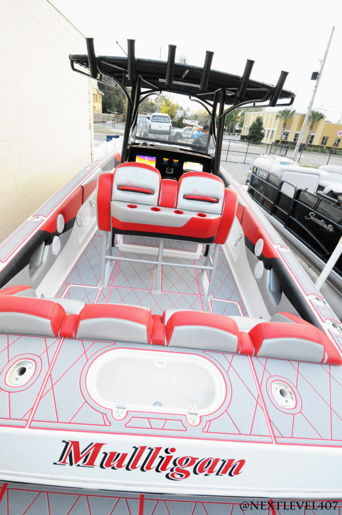 Red-Renegade-Boat-2-Sea-Dek-Marine-Flooring-Pad-Customized-Red-With-LogoDriver-Side-Acrylic-Dash-Radio-Garmin-Moniter-Back-Seats-Mulligan-Logo-Profile