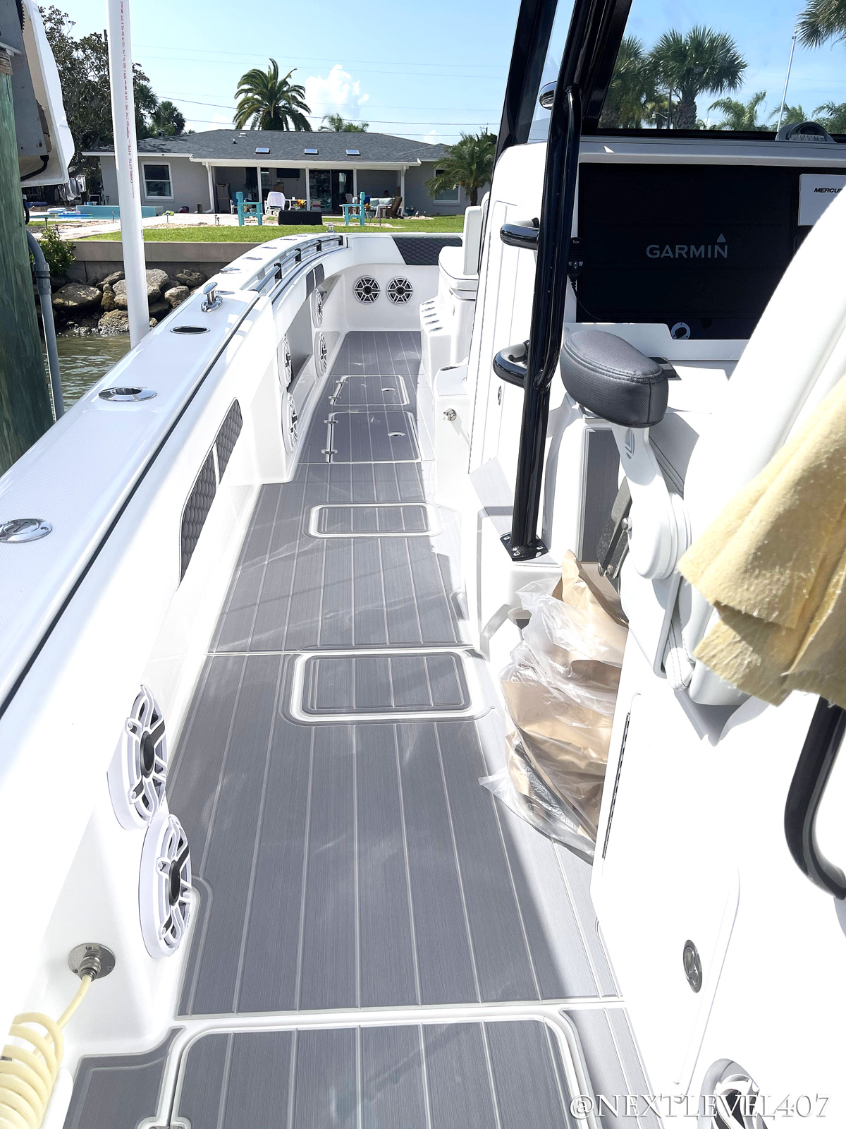AFTER-Blue-Invincible-Boat-Custom-SeaDek-Marine-Flooring -Pad-Upgraded-Speakers-Full-On-Water-Walk-Path-Front-To-Back-Grey-Center-Console- Fishing-Pole-Holder-2 – Florida Marine Customs