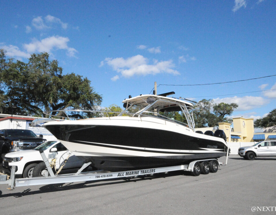 Full view of customized boat on trailer. Hydra Sports boat.
