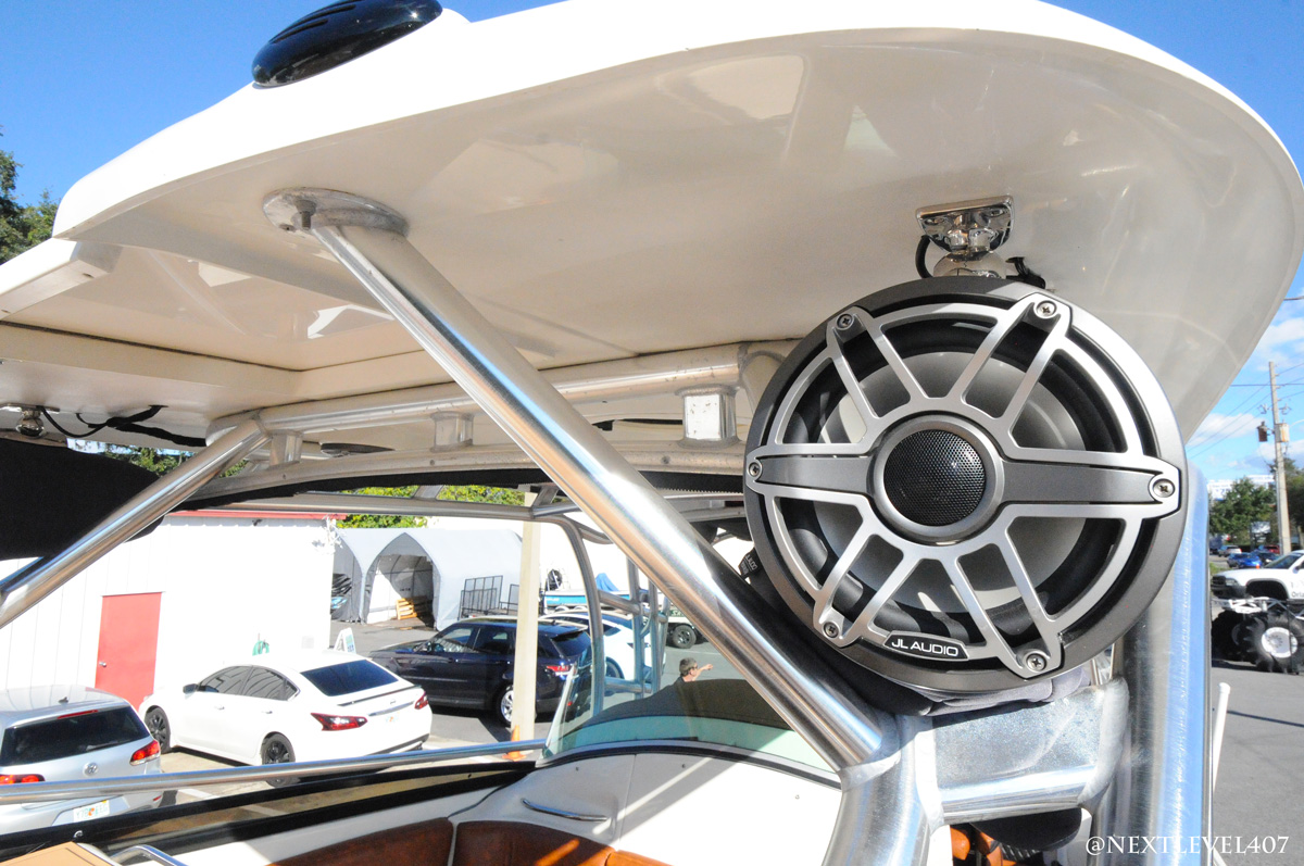 JL Audio speaker, front view of mounted speaker. Hydra Sports boat revamp. Fishing boat, boat flooring, boat speakers, boat navigation upgrade orlando, Florida Marine Customs, Orlando Custom Audio, boat navigation