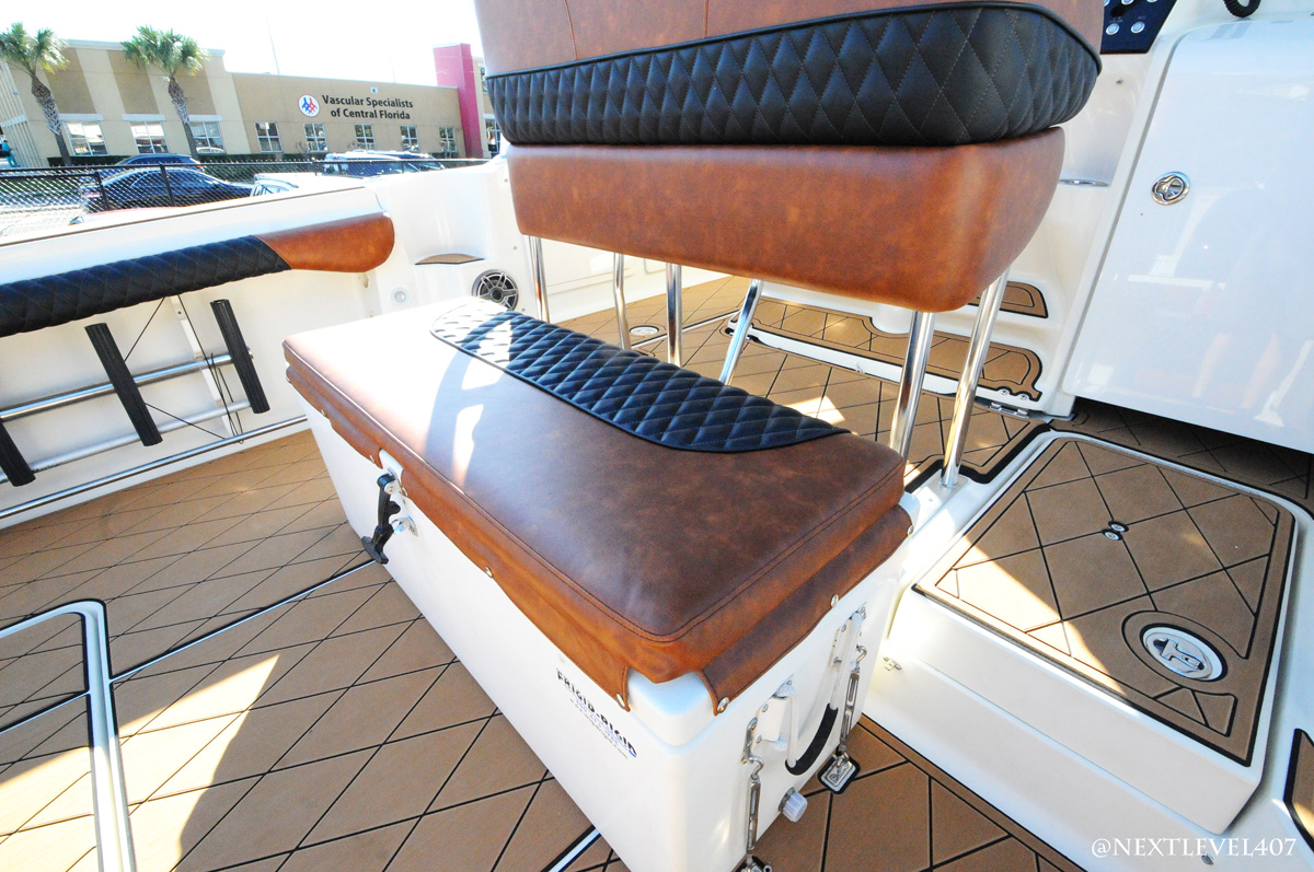 Leather bench upholstery. Photo of bench with SeaDek around it. Custom upholstery. Hydra Sports boat.