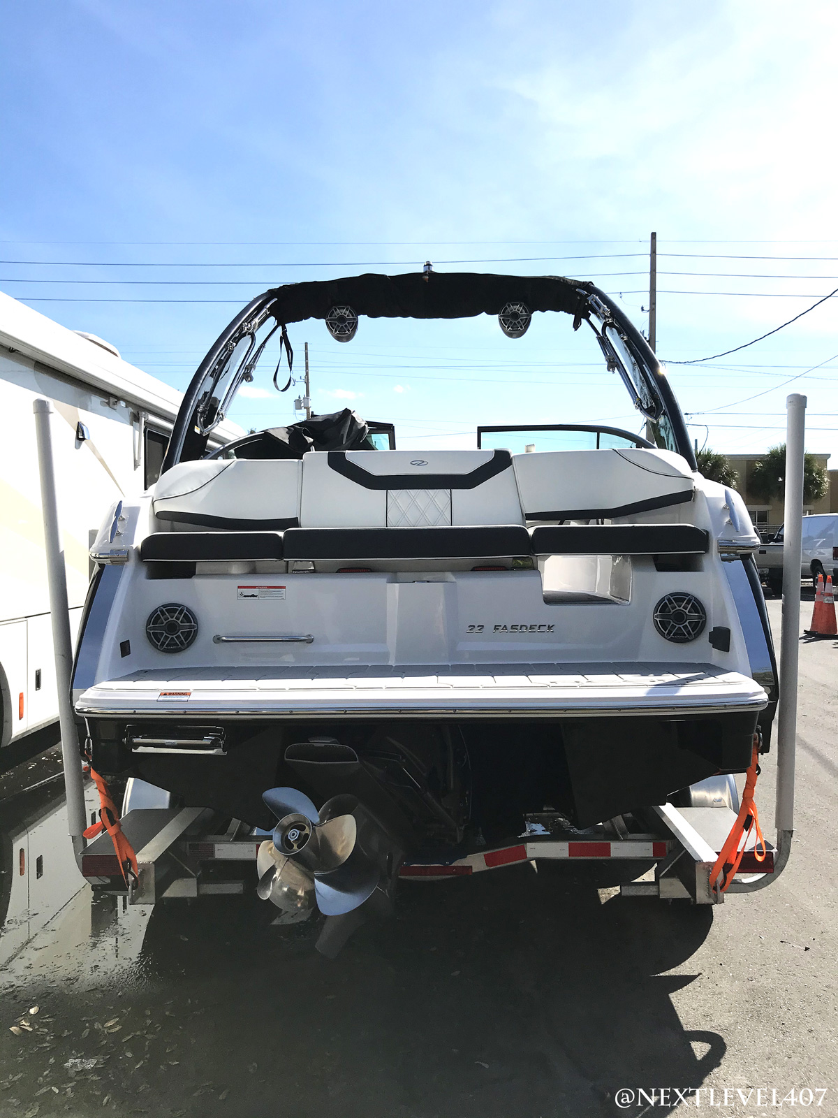 Portriat-Rear-Full-Profile-On-Trailer-Black-Regal-JL-Audio-Next-Level Next Level Florida Marine Customs Regal Boat JL Audio M6 Marine Sound System Install Orlando Rear